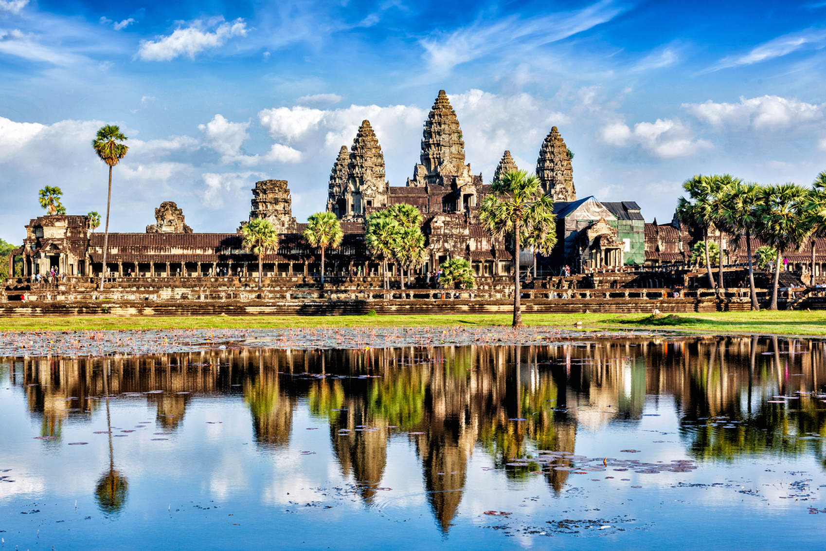 Angkor wat is reflected in the water.
