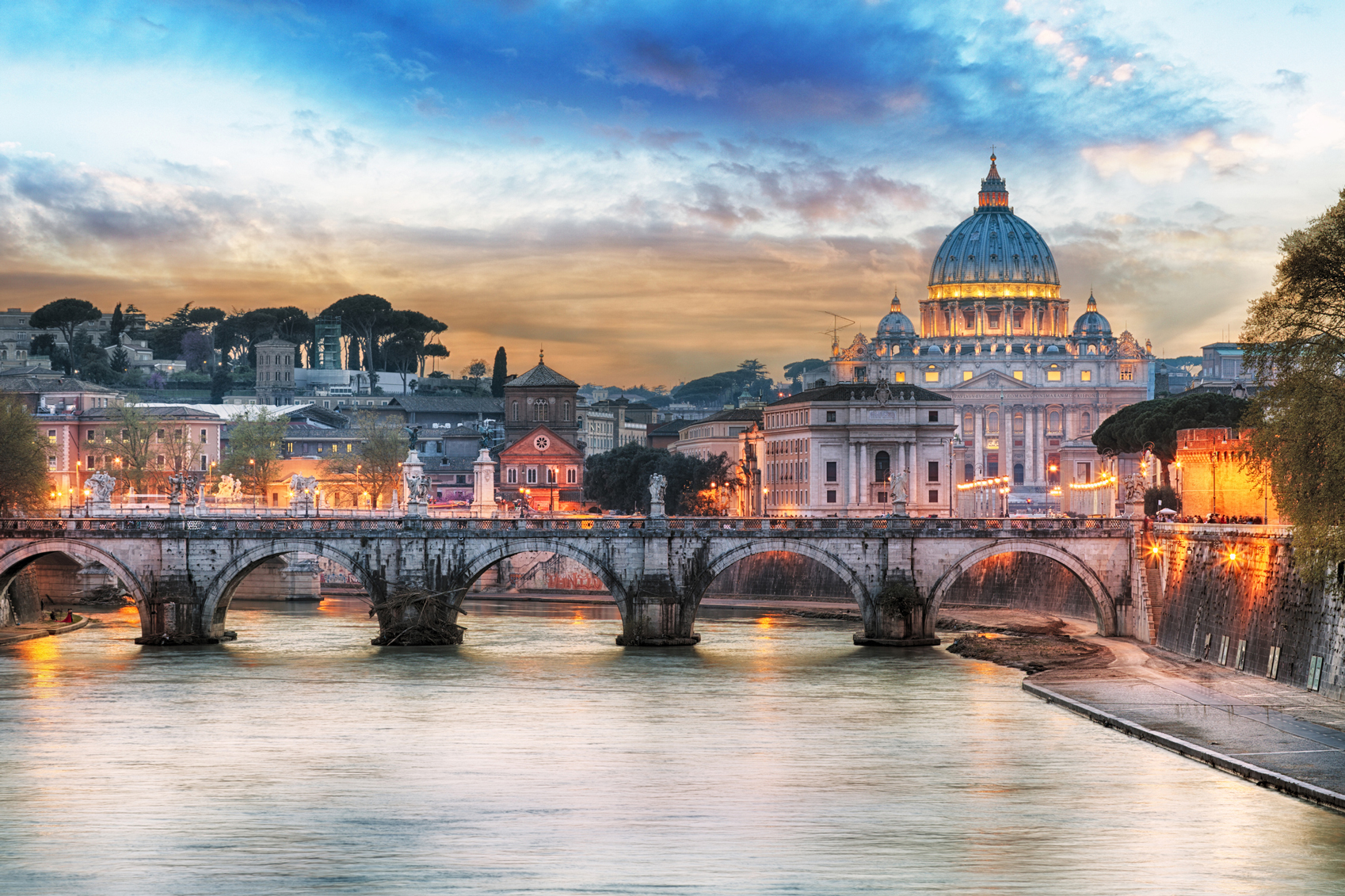 TripAdvisor Top 25 Landmarks St-peter-Basilica-www.istockphoto.comgbphototiber-and-st-peter-basilica-in-vatican-with-rainbow-rome-gm513799120-87792295-TomasSereda