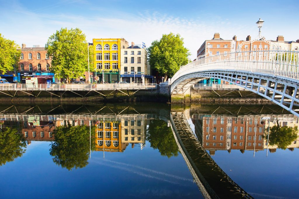 A bridge is reflected in the beautiful waters of Ireland.