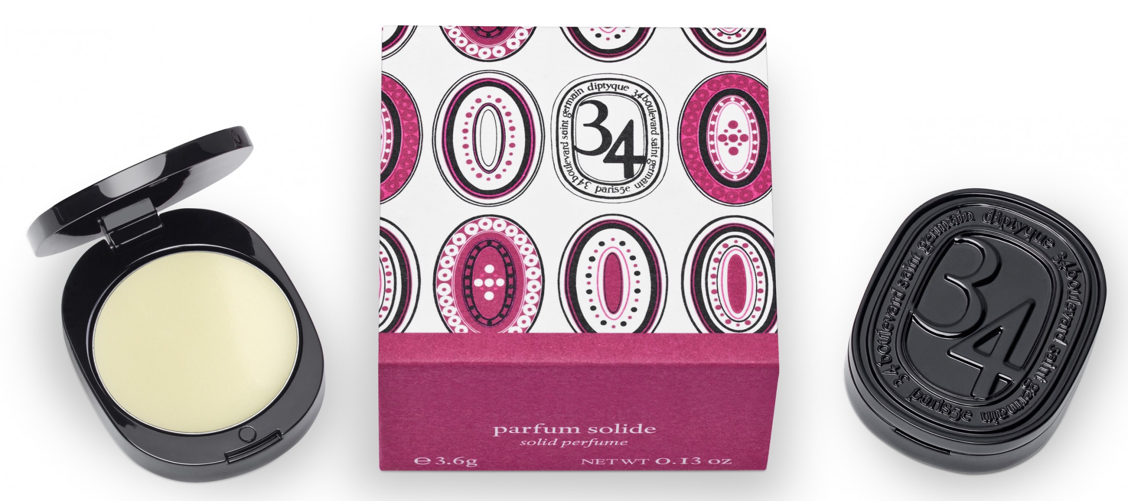 Grooming products - Dr. Dre's lip balm in a box with a pink and black design.