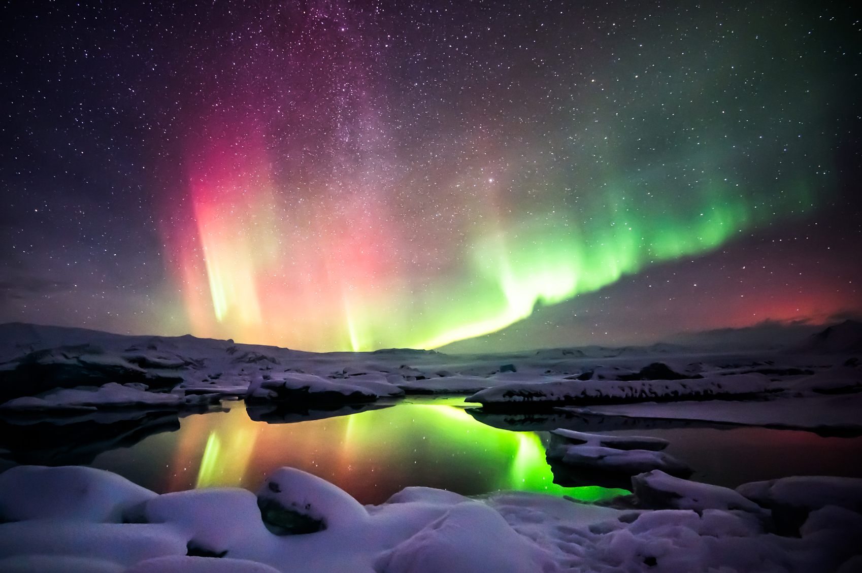 about The Northern Lights Aurora-Jokulsarlon-Lagoon-Iceland-www.istockphoto.com_gb_photo_mixed-aurora-dancing-over-the-jokulsarlon-lagoon-iceland-gm488508586-74186641-krissanapongw