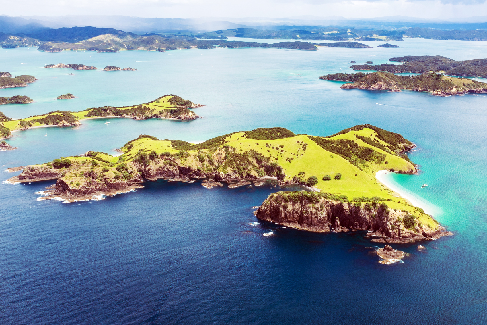 An aerial view of a group of islands in the ocean on New Year's Day.