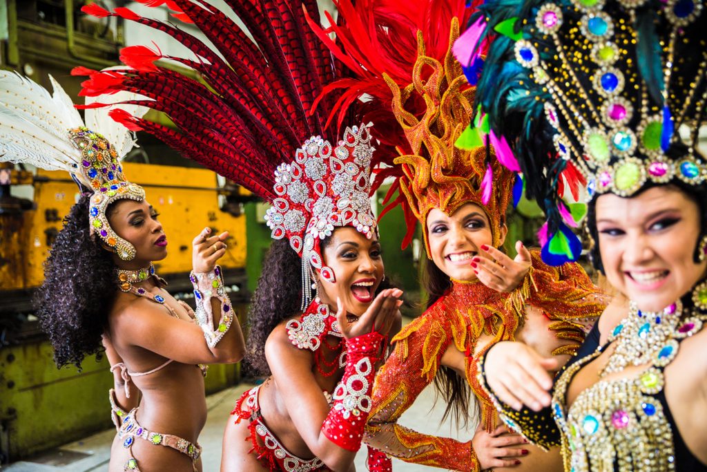 colourful festivals Rio-carnival-www.istockphoto.comgbphotobrazilian-women-wearing-carnival-costume-in-an-old-factory-gm905666874-249718763-filipefrazao