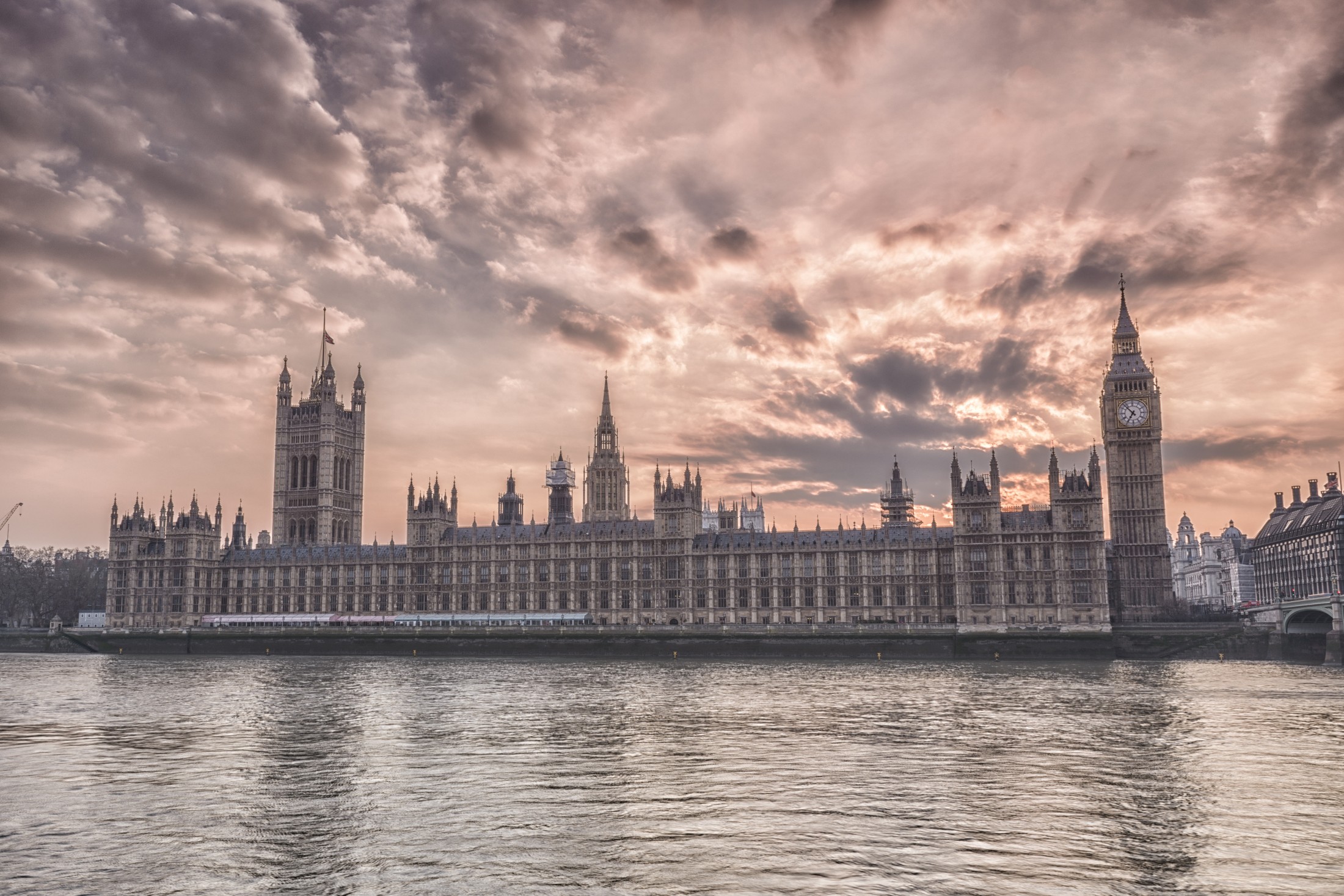 Big Ben, a prominent filming location on the River Thames in London, England.