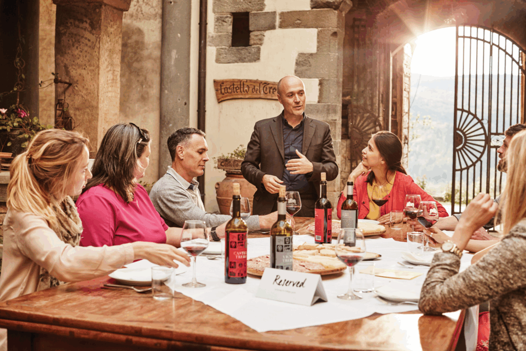 A group of people sitting around a table.