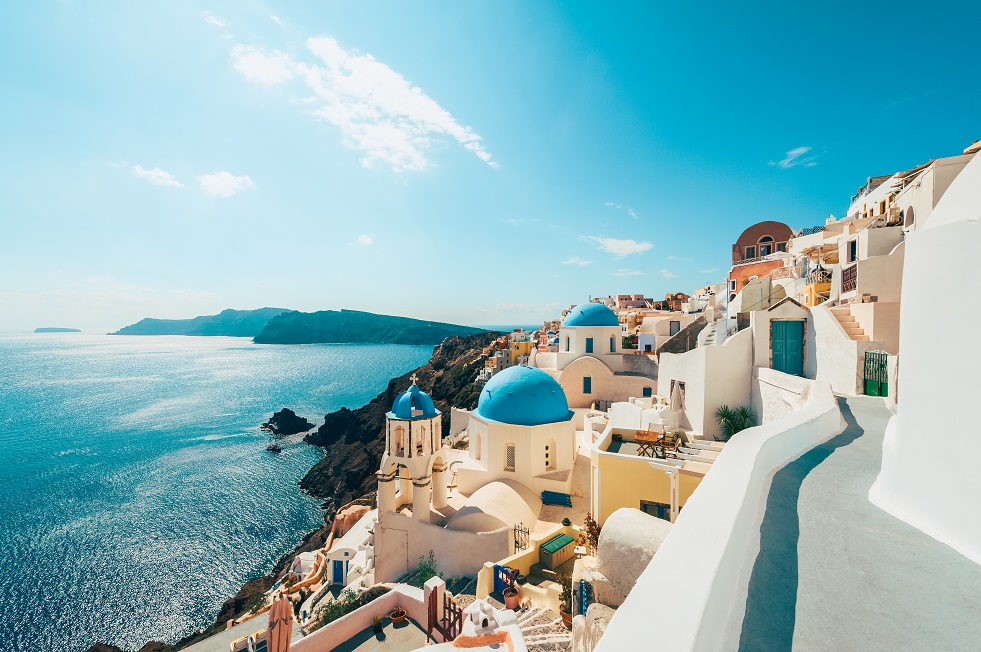 Enjoy stunning views in Oia, Santorini, Greece.