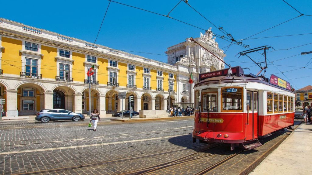 Discover the iconic Lisbon tram tour. Experience the charm of Portugal's capital city as you explore its historic streets and landmarks aboard a traditional tram.