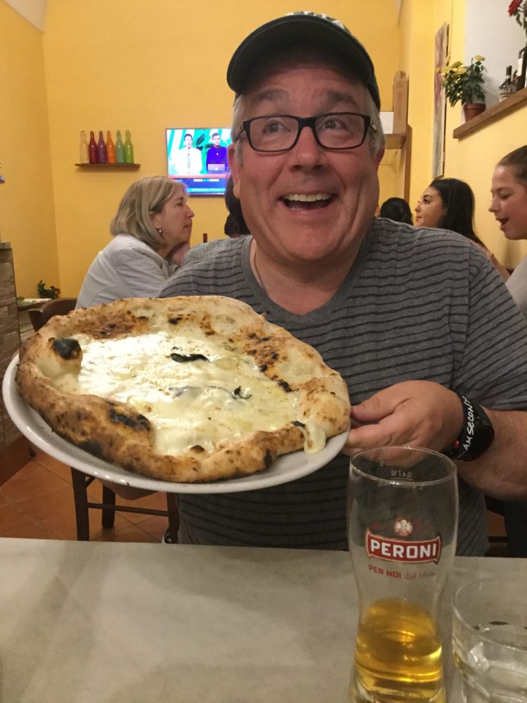 bruce eating pizza