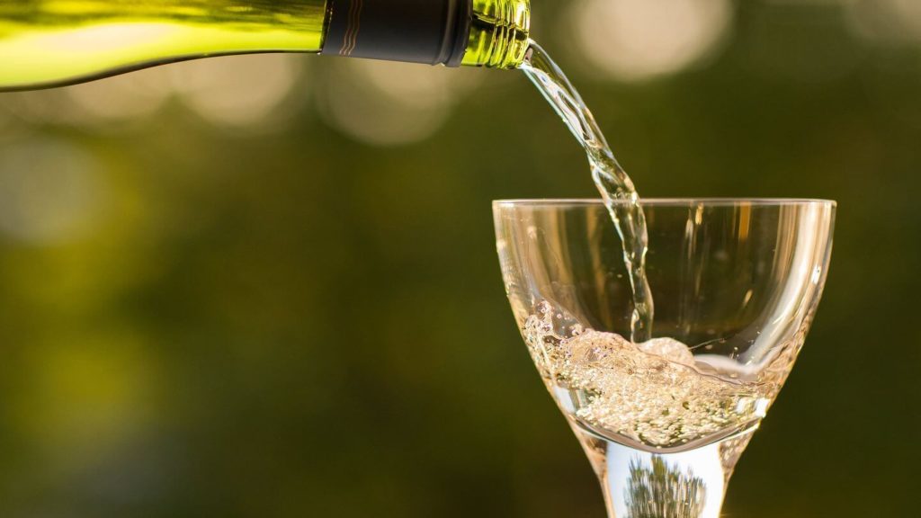 bottle pouring wine love of travel