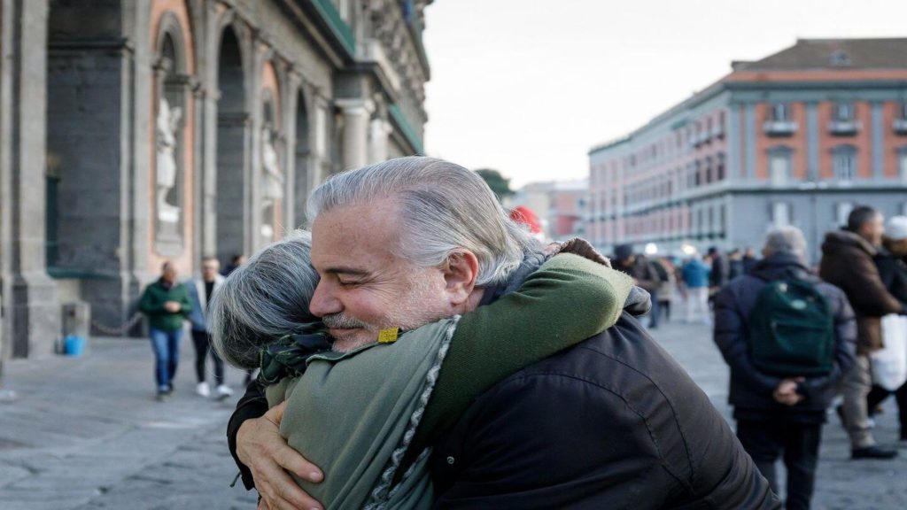 two people hugging kindness proverbs
