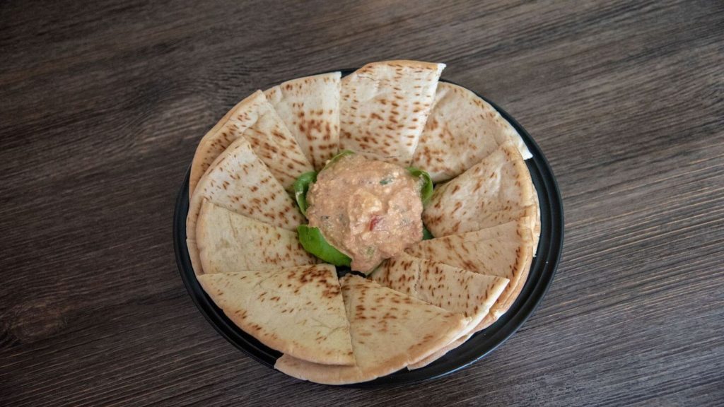 basket of pitta bread and dip