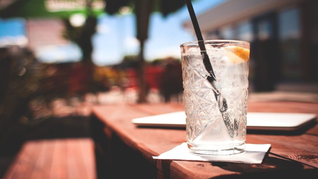 straw in a glass of water