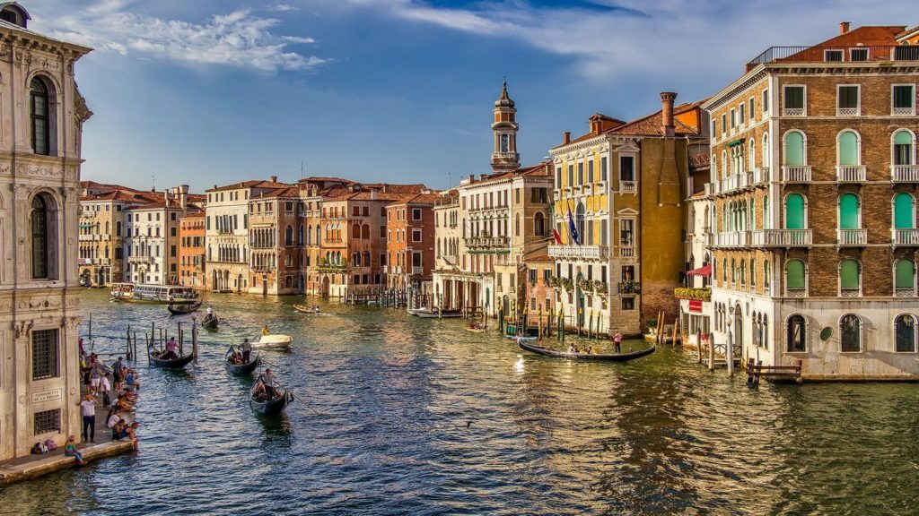gondolas on the canal traditional buildings Venice Italy