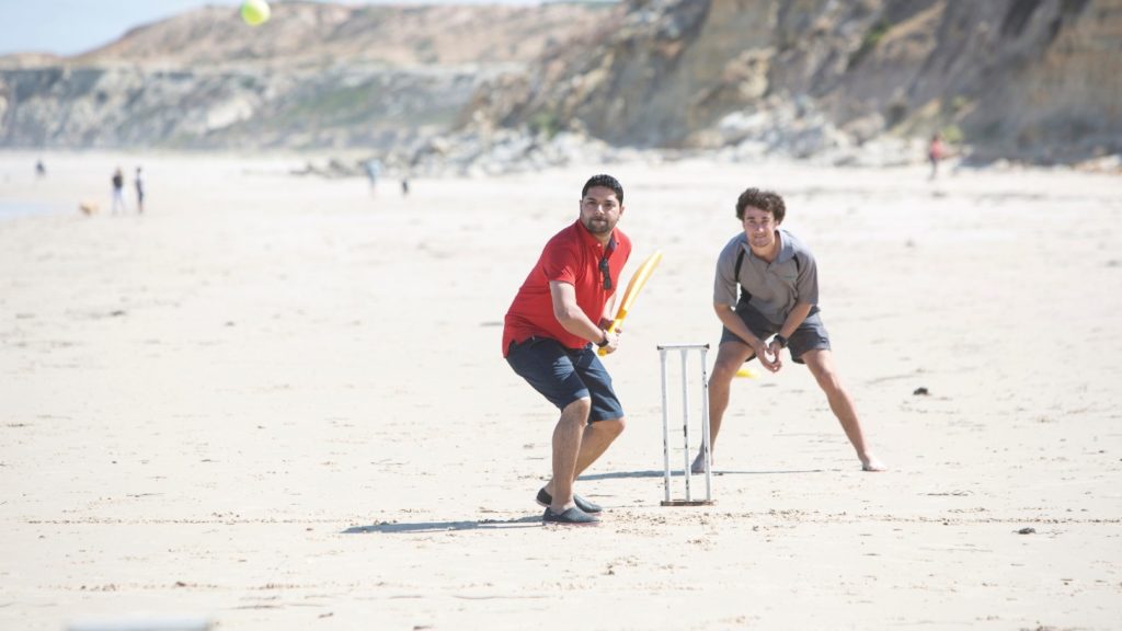Playing cricket on the beach in Australia - Credit Tourism Australia