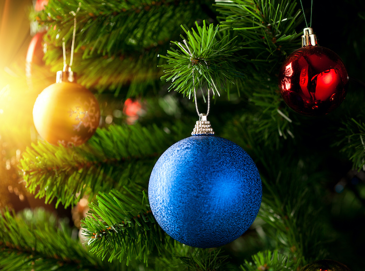 Multicoloured Christmas ornaments hanging on tree
