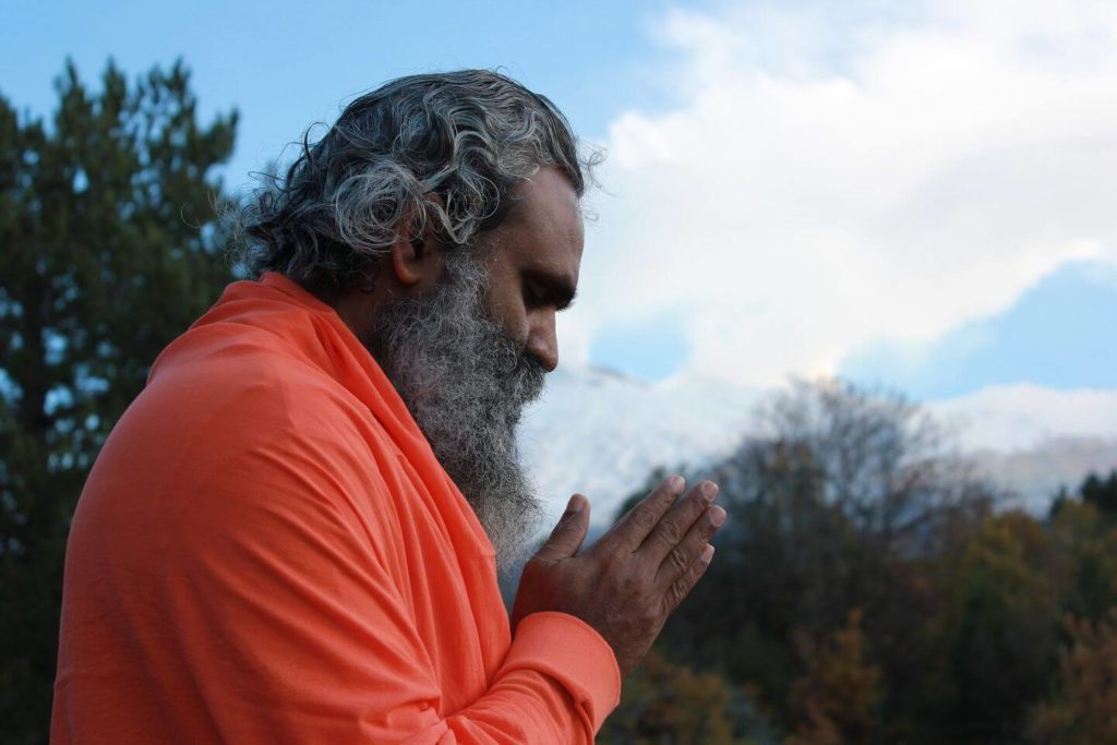 Indian man praying Indian culture