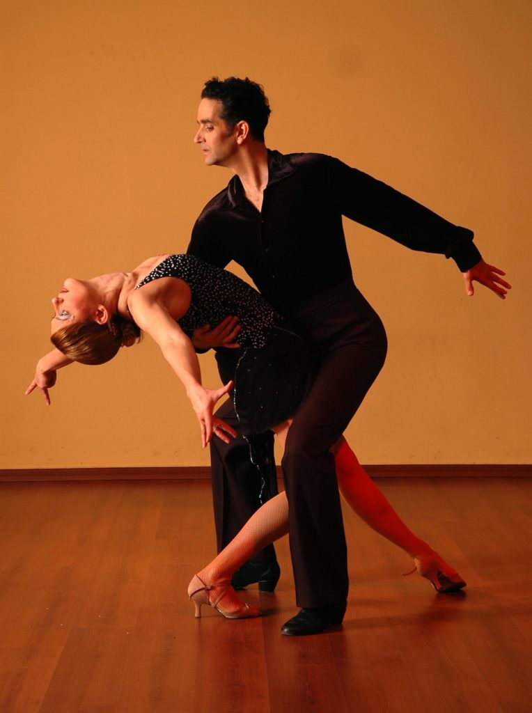 Professional dangers performing the salsa. 