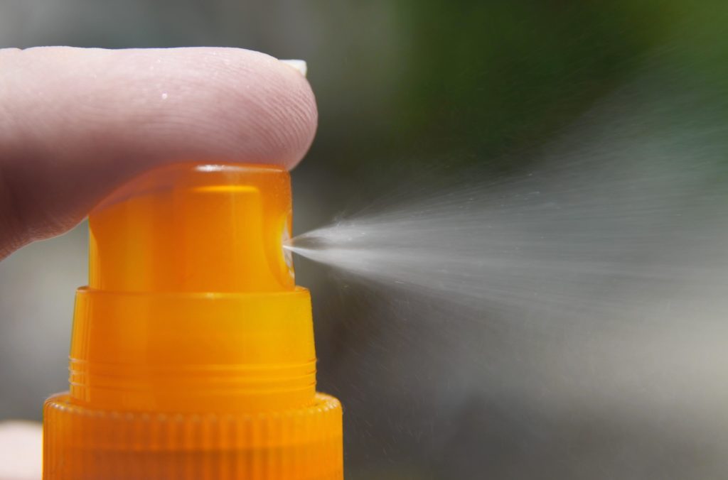 Bug spray being misted.