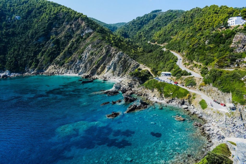 blue ocean green mountains Skopelos trip to Greek Islands