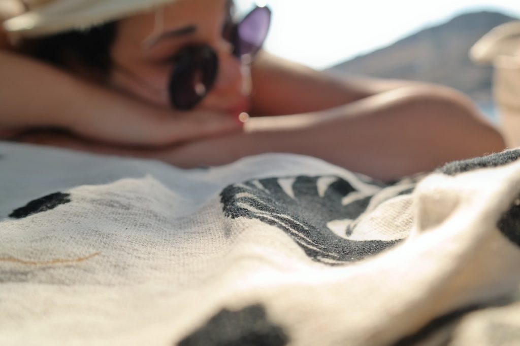lady relaxing on the beach