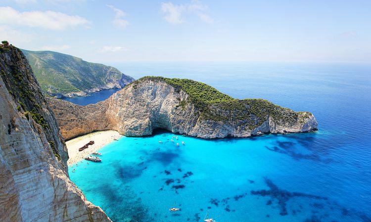 rugged cliffs blue water Zakynthos Greece