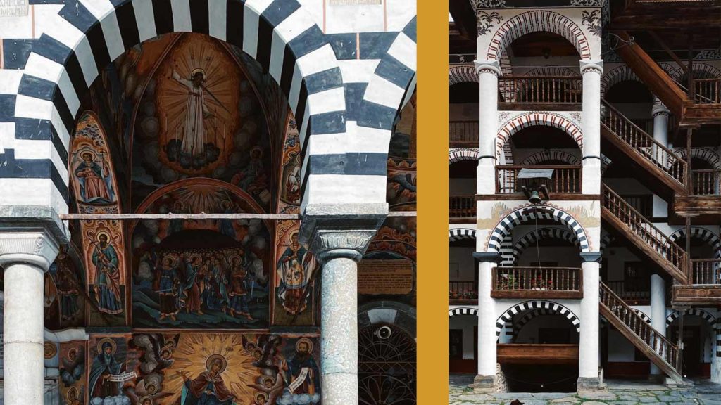 Architectural contrast: colorful religious frescoes and black-and-white striped arches on the left juxtaposed with ornate wooden balconies and spiral staircases on the right, capturing the essence of summer