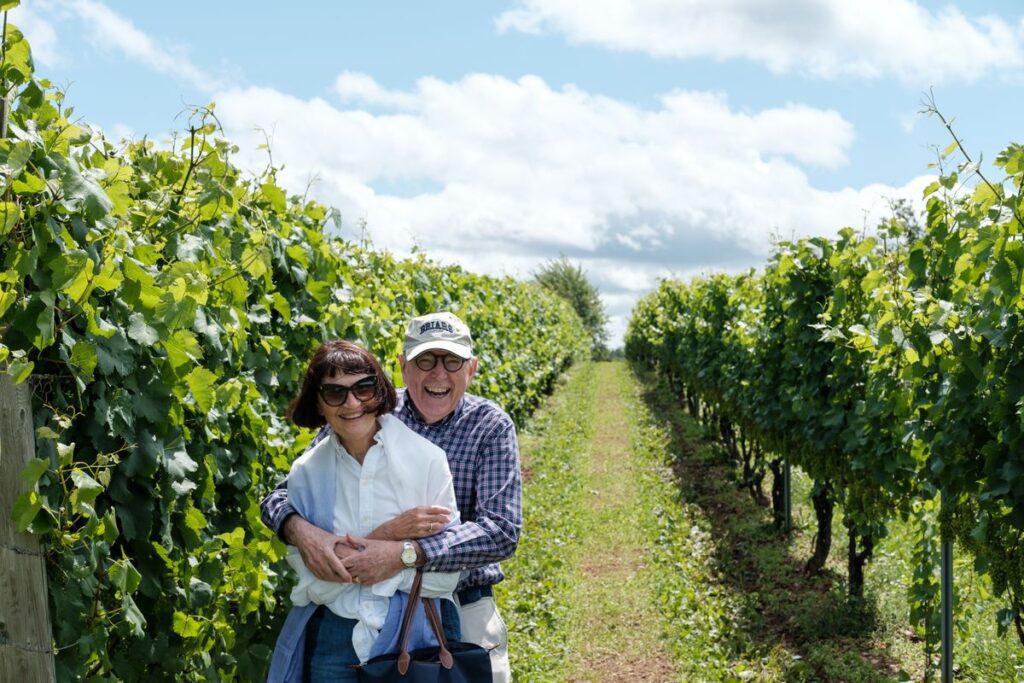 senior couple hugging in a vineyard age is a state of mind