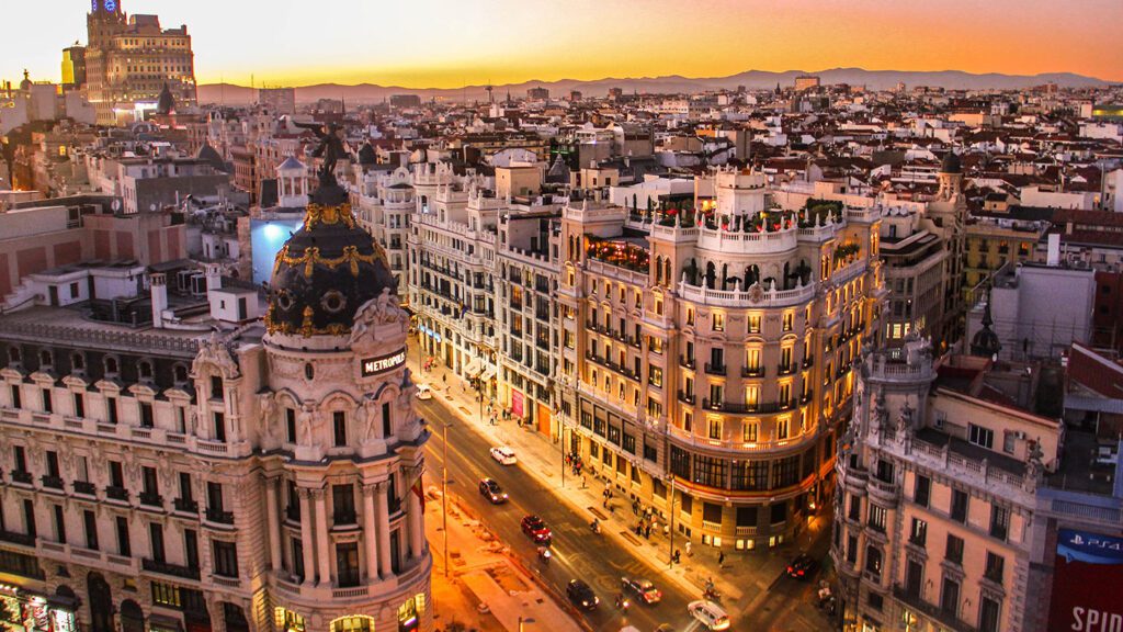 A city in Spain with many buildings and a street.
