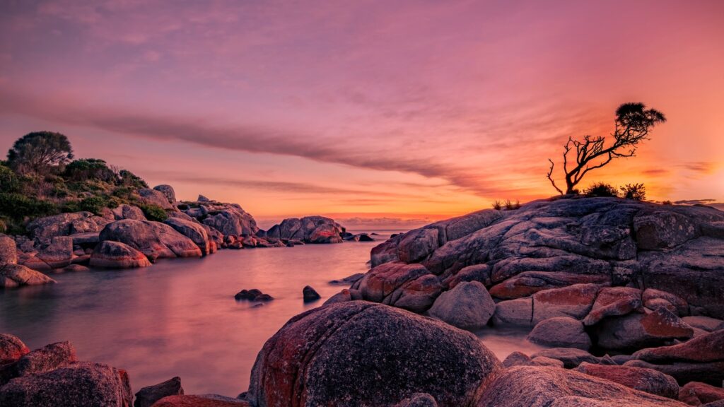 sunset over the rocky oceans in Tasmania Australia