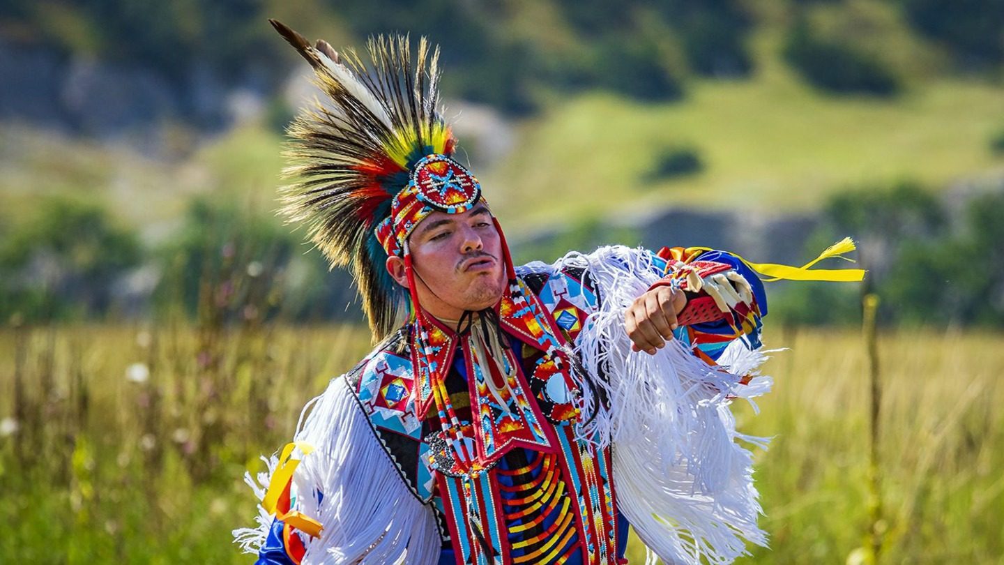 Man in traditional Native American regalia
