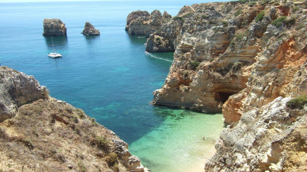 The cliffs of Algarve, Portugal are a stunning sight to behold. Explore the breathtaking views and rugged terrain, perfect for hiking and photography enthusiasts alike.