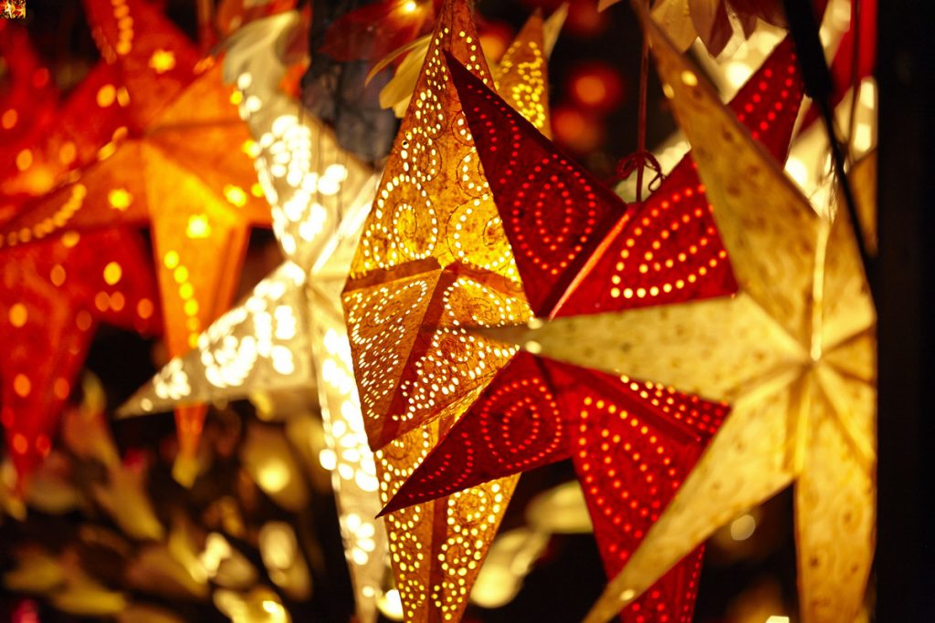 putting up Christmas decorations