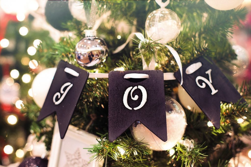 putting up Christmas decorations