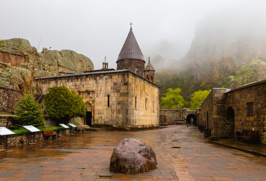 Located in Armenia, this stone building is situated in the center of a spacious courtyard.