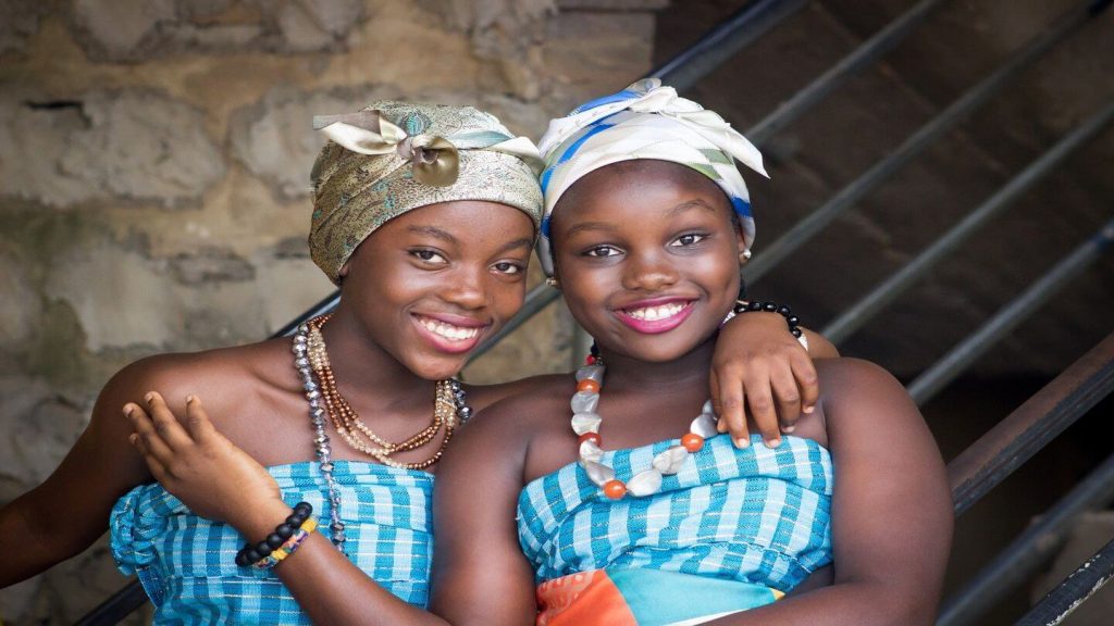 african women in traditional dress - learning through travel