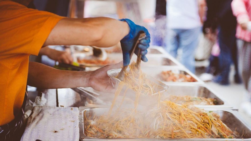 cooking noodles street food