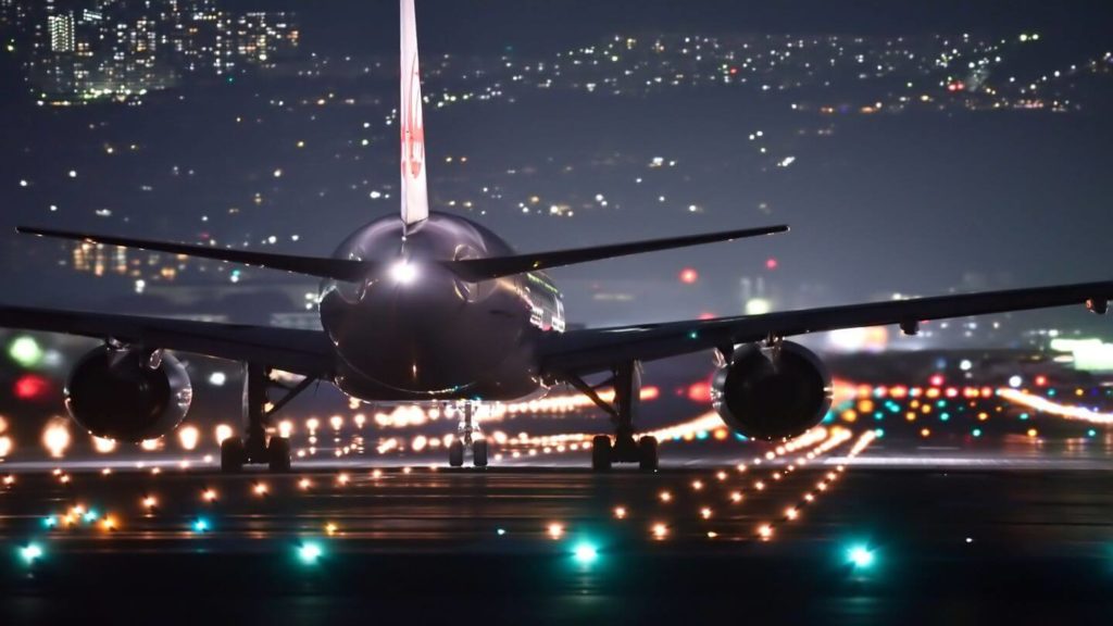 plane on runway at night