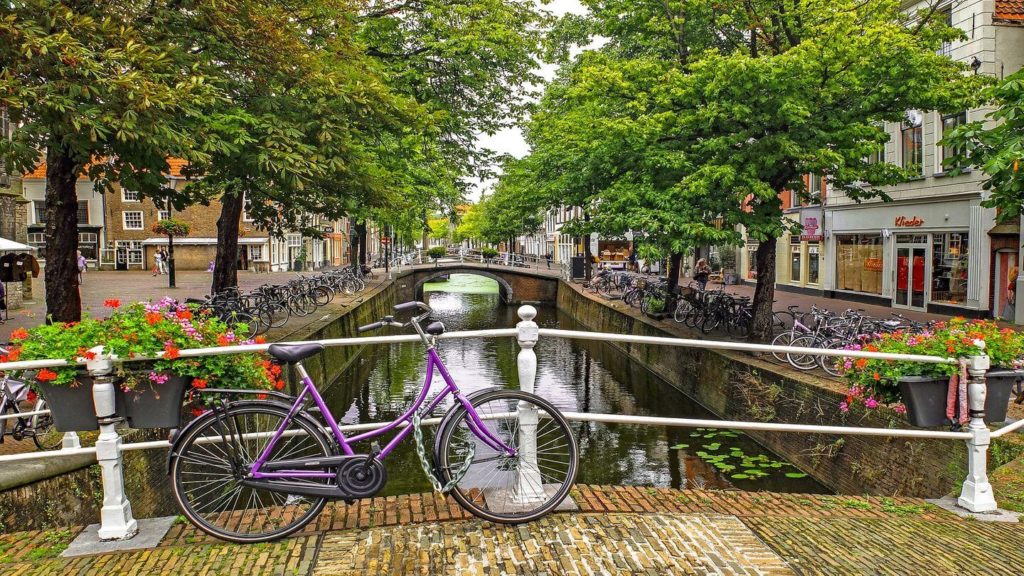 bicycles parked along Amsterdam canal
