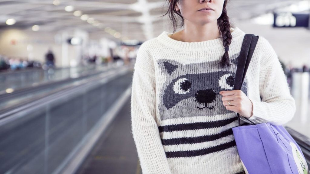 woman walking through airport